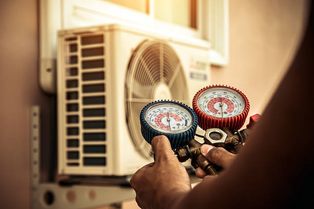Professional Air Conditioning Service technician working in Moore, SC